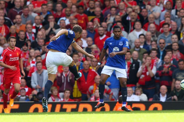 LIVERPOOL, ENGLAND - SEPTEMBER 27:  Phil Jagielka of Everton scores a late goal to level the scores at 1-1 during the Barclays Premier League match between Liverpool and Everton at Anfield on September 27, 2014 in Liverpool, England.  (Photo by Alex Livesey/Getty Images)
