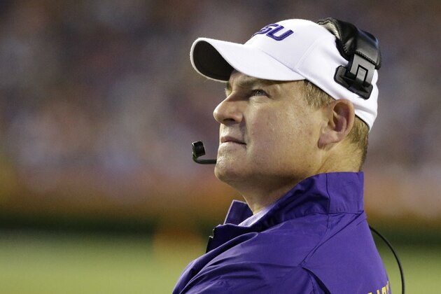 FILE- In this Oct. 11, 2014, file photo, LSU head coach Les Miles looks at the scoreboard during the first half of an NCAA college football game against Florida in Gainesville, Fla. LSU will face Notre Dame in the Music City Bowl, Tuesday, Dec. 30, in Nashville, Tenn. (AP Photo/John Raoux, File)