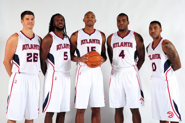 ATLANTA, GA - SEPTEMBER 29: Kyle Korver #26, DeMarre Carroll #5, Al Horford #15, Paul Millsap #4, and Jeff Teague #0 of the Atlanta Hawks pose for a photograph during the Atlanta Hawks Media Day on September 29, 2014 at Philips Arena in Atlanta, Georgia.  NOTE TO USER: User expressly acknowledges and agrees that, by downloading and/or using this Photograph, user is consenting to the terms and conditions of the Getty Images License Agreement. Mandatory Copyright Notice: Copyright 2014 NBAE (Photo by Scott Cunningham/NBAE via Getty Images)