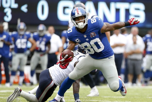 New York Giants wide receiver Victor Cruz (80) brings the all up field against the Houston Texans in the second quarter of an NFL football game, Sunday, Sept. 21, 2014, in East Rutherford, N.J. (AP Photo/Kathy Willens)