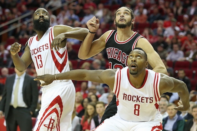 Feb 4, 2015; Houston, TX, USA; Houston Rockets forward Joey Dorsey (8) and guard James Harden (13) block out Chicago Bulls center Joakim Noah (13) in the second quarter at Toyota Center. Mandatory Credit: Thomas B. Shea-USA TODAY Sports
