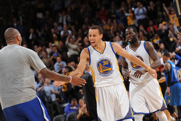 OAKLAND, CA - FEBRUARY 4: Stephen Curry #30 of the Golden State Warriors celebrates while facing the Dallas Mavericks on February 4, 2015 at Oracle Arena in Oakland, California. NOTE TO USER: User expressly acknowledges and agrees that, by downloading and or using this photograph, user is consenting to the terms and conditions of Getty Images License Agreement. Mandatory Copyright Notice: Copyright 2015 NBAE (Photo by Noah Graham/NBAE via Getty Images)