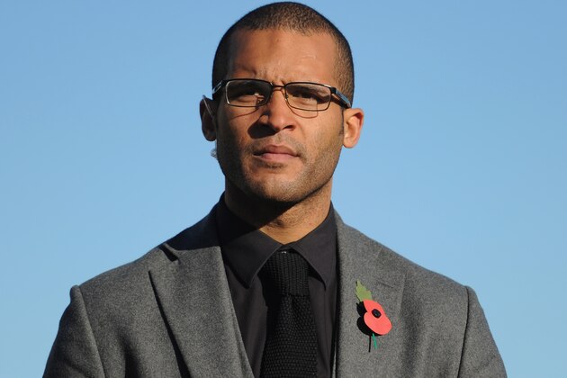 BISHOP'S STORTFORD, ENGLAND - NOVEMBER 10:  Former Northampton Town player Clarke Carlisle before the FA Cup First Round match between Bishop's Storford and Northampton Town ProKit UK stadium on November 10, 2013 in Bishop's Stortford, England.  (Photo by Shaun Botterill/Getty Images)