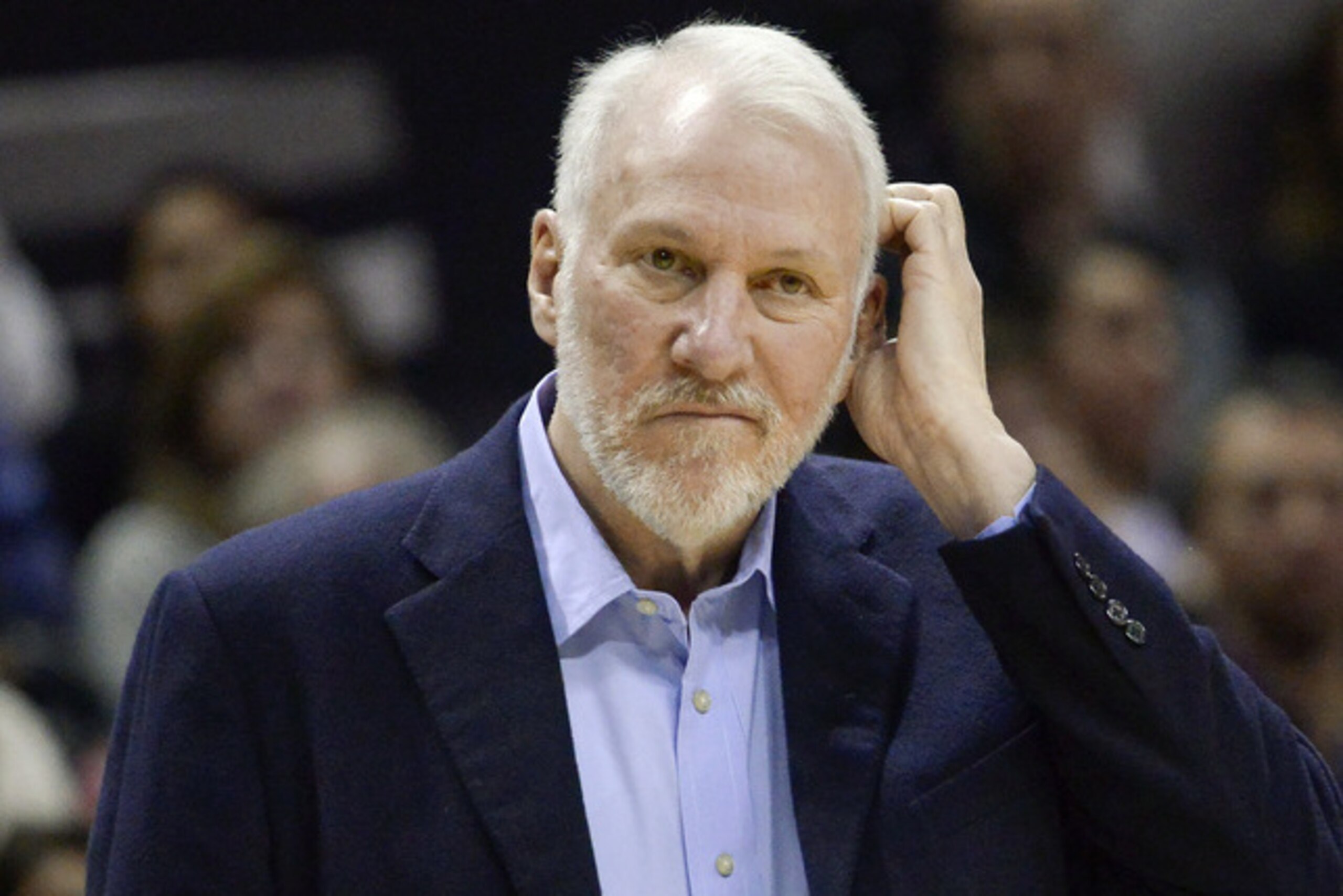 San Antonio Spurs coach Gregg Popovich watches play during the second half of an NBA basketball game against the Orlando Magic, Wednesday, Feb. 4, 2015, in San Antonio. San Antonio won 110-103. (AP Photo/Darren Abate)