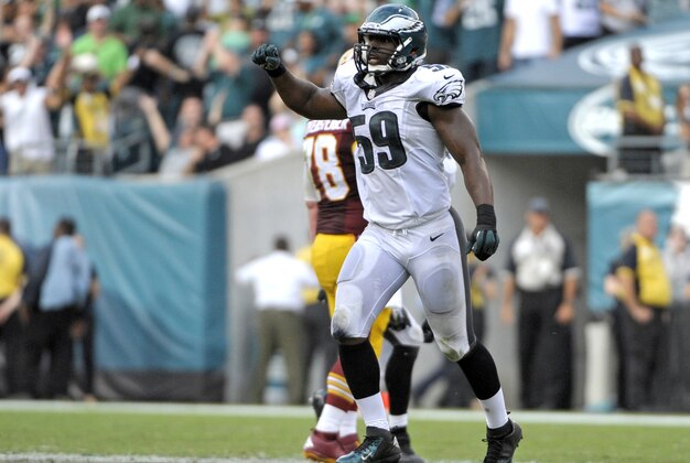 Sep 21, 2014; Philadelphia, PA, USA; Philadelphia Eagles inside linebacker DeMeco Ryans (59) celebrates a defensive stop on third down against the Washington Redskins at Lincoln Financial Field. The Eagles defeated the Redskins, 37-34. Mandatory Credit: Eric Hartline-USA TODAY Sports