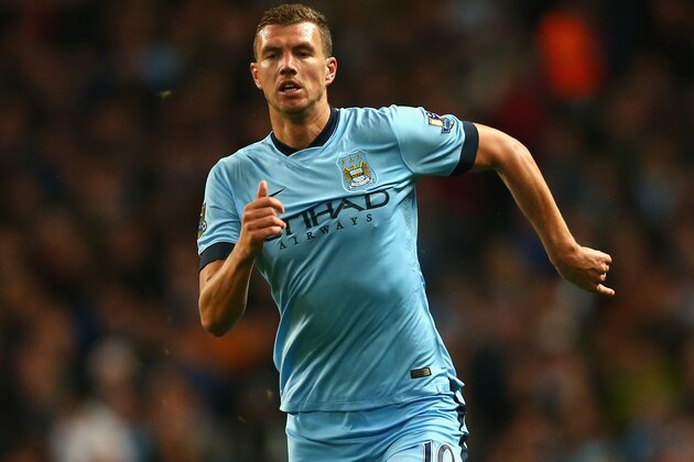 MANCHESTER, ENGLAND - AUGUST 25:  Edin Dzeko of Manchester City in action during the Barclays Premier League match between Manchester City and Liverpool at the Etihad Stadium on August 25, 2014 in Manchester, England.  (Photo by Clive Brunskill/Getty Images)