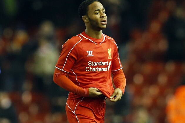 Liverpool's Raheem Sterling leaves the pitch at the end of the English League Cup semi-final first leg soccer match between Liverpool and Chelsea at Anfield Stadium, Liverpool, England, Tuesday Jan. 20, 2015. (AP Photo/Jon Super)
