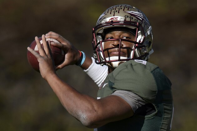 Florida State quarterback Jameis Winston throws a pass during NCAA college football practice in Carson, Calif., Sunday, Dec. 28, 2014. Florida State is scheduled to play Oregon in the Rose Bowl NCAA college football playoff semifinal on New Year's Day. (AP Photo/Kelvin Kuo)