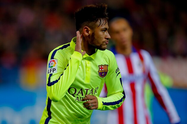 MADRID, SPAIN - JANUARY 28:  Neymar JR. of FC Barcelona celebrates scoring their third goal during the Copa del Rey Round of 8 second leg match between Club Atletico de Madrid and FC Barcelona at Vicente Calderon Stadium on January 28, 2015 in Madrid, Spain.  (Photo by Gonzalo Arroyo Moreno/Getty Images)