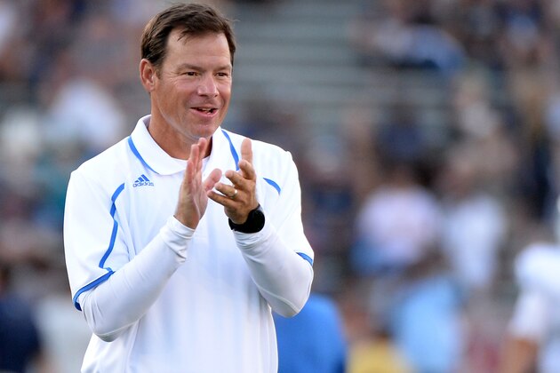 PASADENA, CA - AUGUST 31:  Head coach Jim Mora of the UCLA Bruins claps to encourage his team before the game against the Nevada Wolf Pack at Rose Bowl on August 31, 2013 in Pasadena, California.  (Photo by Harry How/Getty Images)