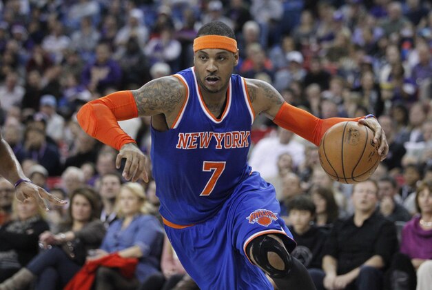 Dec 27, 2014; Sacramento, CA, USA; New York Knicks forward Carmelo Anthony (7) dribbles the ball against the Sacramento Kings in the second quarter at Sleep Train Arena. Mandatory Credit: Cary Edmondson-USA TODAY Sports