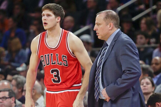 Chicago Bulls forward Doug McDermott (3) checks in while Chicago Bulls' head coach Tom Thibodeau talks to him during the first half of an NBA basketball game against the New York Knicks, Wednesday, Oct. 29, 2014, in New York. (AP Photo/Frank Franklin II)