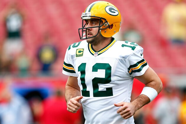 TAMPA, FL - DECEMBER 21:  Aaron Rodgers #12 of the Green Bay Packers warms up prior to facing the Tampa Bay Buccaneers at Raymond James Stadium on December 21, 2014 in Tampa, Florida.  (Photo by Kevin C. Cox/Getty Images)