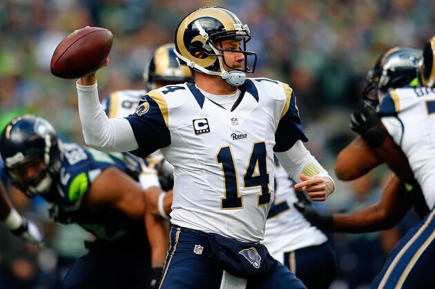 SEATTLE, WA - DECEMBER 28: Quarterback Shaun Hill #14 of the St. Louis Rams passes the ball during the first quarter of the game at CenturyLink Field on December 28, 2014 in Seattle, Washington. (Photo by Jonathan Ferrey/Getty Images)