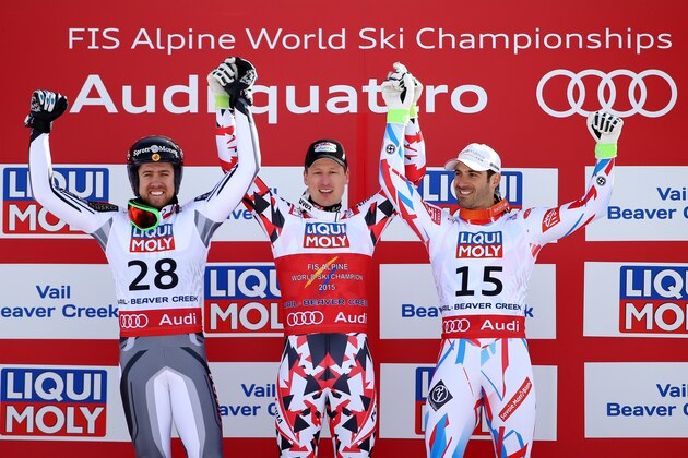 BEAVER CREEK, CO - FEBRUARY 05:  (L-R) Second place finisher Dustin Cook of Canada, first place finisher Hannes Reichelt of Austria, and third place finisher Adrien Theaux stand on the podiun following the Men's Super-G in Red Tail Stadium on Day 4 of the 2015 FIS Alpine World Ski Championships on February 5, 2015 in Beaver Creek, Colorado.  (Photo by Al Bello/Getty Images)