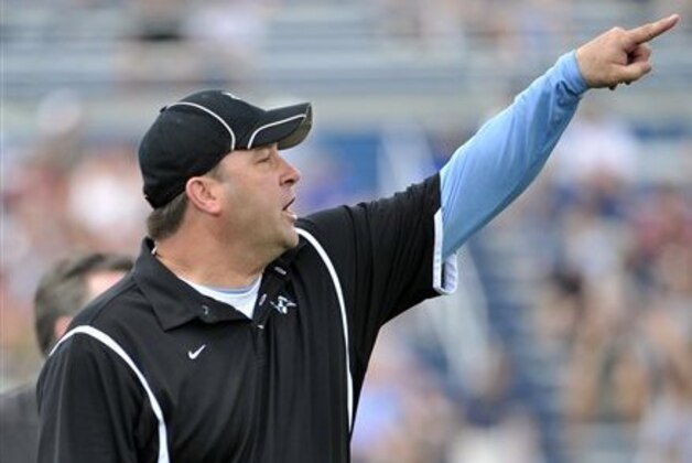 Johns Hopkins Head Lacrosse Coach Dave Pietramala directs his team from the sidelines during an NCAA men's Division Iacrosse tournament quarterfinal against Denver on Saturday, May 21, 2011 at Hofstra University in Hempstead, N.Y. (AP Photo/Kathy Kmonicek)
