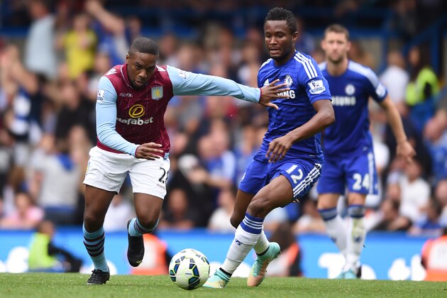 Aston Villa’s Charles N’Zogbia competes for the ball with Chelsea’s John Mikel Obi during their English Premier League soccer match at Stamford Bridge, London, Saturday, Sept. 27, 2014. (AP Photo/Tim Ireland)