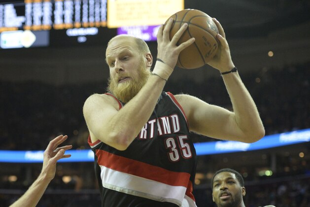 Jan 28, 2015; Cleveland, OH, USA; Portland Trail Blazers center Chris Kaman (35) rebounds in the fourth quartet against the Cleveland Cavaliers at Quicken Loans Arena. Mandatory Credit: David Richard-USA TODAY Sports
