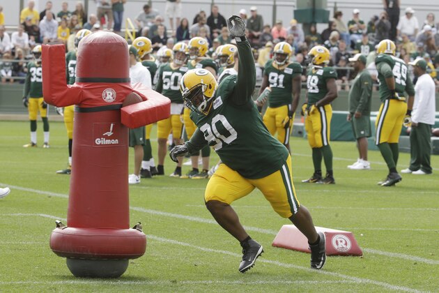 Green Bay Packers’ B.J. Raji runs a drill during NFL football training camp Monday, July 28, 2014, in Green Bay, Wis. (AP Photo/Morry Gash)
