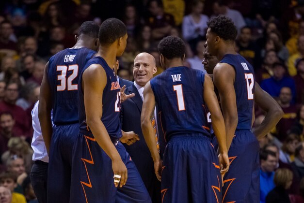 Jan 24, 2015; Minneapolis, MN, USA; Illinois Fighting Illini head coach John Groce talks to his team during a time out in the first half against the Minnesota Gophers at Williams Arena. The Minnesota Gophers beat the Illinois Fighting Illini 79-71. Mandatory Credit: Brad Rempel-USA TODAY Sports