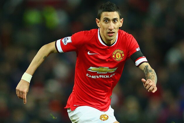 MANCHESTER, ENGLAND - FEBRUARY 03:  Angel di Maria of Manchester United on the ball during the FA Cup Fourth round replay match between Manchester United and Cambridge United at Old Trafford on February 3, 2015 in Manchester, England.  (Photo by Clive Mason/Getty Images)