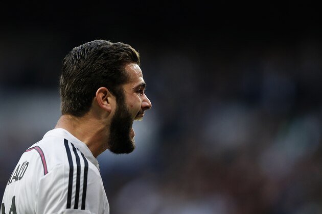 Real Madrid's Jose Ignacio Fernandez 'Nacho' celebrates his goal during a Spanish La Liga soccer match between Real Madrid and Espanyol at the Santiago Bernabeu stadium  in Madrid, Spain, Saturday, Jan. 10, 2015 . (AP Photo/Daniel Ochoa de Olza)