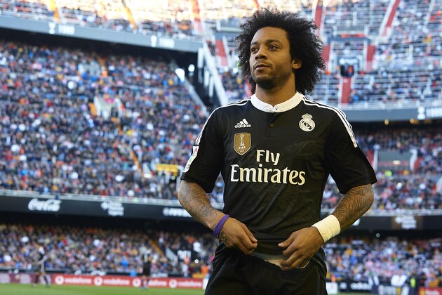 VALENCIA, SPAIN - JANUARY 04:  Marcelo of Real Madrid looks on prior to the start of the La Liga match between Valencia CF and Real Madrid CF at Estadi de Mestalla on January 4, 2015 in Valencia, Spain.  (Photo by Manuel Queimadelos Alonso/Getty Images)