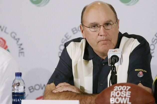 University of Michigan Wolverines' quarterback Chad Henne, left, and offensive coordinator Mike DeBord, take questions on the upcoming Rose Bowl football game against USC, during a news conference in Beverly Hills, Calif., Friday, Dec. 29, 2006. (AP Photo/Damian Dovarganes)