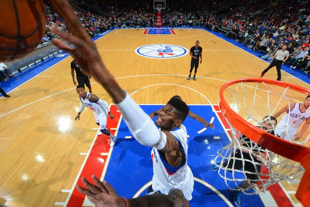 PHILADELPHIA, PA  JANUARY 30: Nerlens Noel #4 of the Philadelphia 76ers blocks a shot against the Minnesota Timberwolves at Wells Fargo Center on January 30, 2015 in Philadelphia, Pennsylvania NOTE TO USER: User expressly acknowledges and agrees that, by downloading and/or using this Photograph, user is consenting to the terms and conditions of the Getty Images License Agreement. Mandatory Copyright Notice: Copyright 2015 NBAE (Photo by Jesse D. Garrabrant/NBAE via Getty Images)