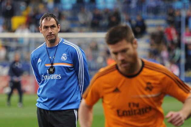 MALAGA, SPAIN - MARCH 15:  Assistant coach Paul Clement (R) of Real Madrid FC warms-up his players before the La Liga match between Malaga and Real Madrid at La Rosaleda Stadium on March 15, 2014 in Malaga, Spain.  (Photo by Denis Doyle/Getty Images)