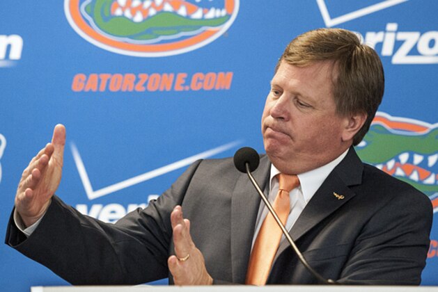 Jim McElwain, Florida's new head football coach, speaks to the media during an NCAA college football news conference, Saturday, Dec. 6, 2014, in Gainesville, Fla.  (AP Photo/Phil Sandlin)