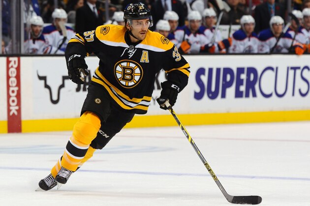 BOSTON, MA - NOVEMBER 6: Patrice Bergeron #37 of the Boston Bruins skates against the Edmonton Oilers at the TD Garden on November 6, 2014 in Boston, Massachusetts.  (Photo by Steve Babineau/NHLI via Getty Images)