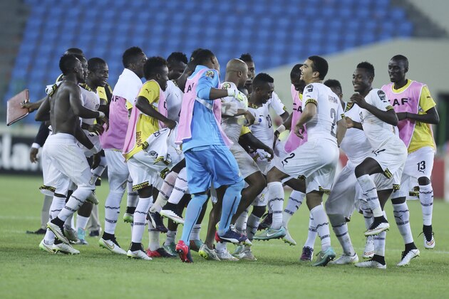 Ghana's soccer team players celebrates after their African Cup of Nations Semifinals soccer match with Equatorial Guinea at Estadio De Malabo, Equatorial Guinea, Thursday Feb. 5, 2015. (AP Photo/Sunday Alamba)