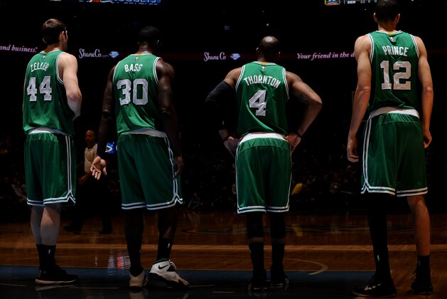 DENVER, CO - JANUARY 23:  Tyler Zeller #44, Brandon Bass #30, Marcus Thornton #4, and Tayshaun Prince #12 of the Boston Celtics during the game against the Denver Nuggets on January 23, 2015 at the Pepsi Center in Denver, Colorado. NOTE TO USER: User expressly acknowledges and agrees that, by downloading and or using this Photograph, user is consenting to the terms and conditions of the Getty Images License Agreement. Mandatory Copyright Notice: Copyright 2015 NBAE (Photo by Bart Young/NBAE via Getty Images)