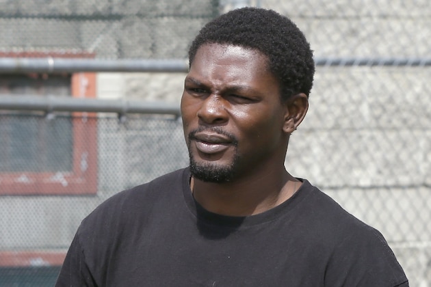 Boxer Jermain Taylor walks from the Pulaski County Jail in Little Rock, Ark., Wednesday, Aug. 27, 2014. Taylor is free on a $25,000 bond after the former middleweight champion was jailed overnight in Little Rock in connection with a shooting that wounded his cousin. (AP Photo/Danny Johnston)