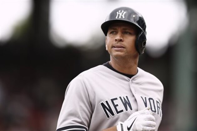 FILE - In this Sept. 14, 2013, file photo, New York Yankees' Alex Rodriguez heads to the dugout during their 5-1 loss to the Boston Red Sox  in a baseball game at Fenway Park in Boston. The U.S. government says New York Yankees star Alex Rodriguez paid his cousin almost $1 million to keep secret Rodriguez's use of performance enhancing drugs. In court documents filed last week in Miami, federal prosecutors say Rodriguez paid $900,000 last year to settle a threatened lawsuit by Yuri Sucart, who had worked as Rodriguez's personal assistant. Sucart, in a letter from his lawyer, threatened to expose Rodriquez's PED use if he wasn't paid $5 million.(AP Photo/Winslow Townson, File)
