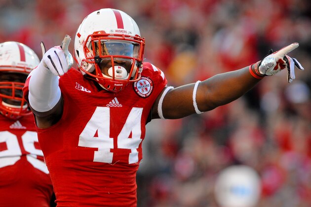 LINCOLN, NE - NOVEMBER 16: Defensive end Randy Gregory #44 of the Nebraska Cornhuskers reacts after a tackle during their game at against the Michigan State Spartans Memorial Stadium on November 16, 2013 in Lincoln, Nebraska. (Photo by Eric Francis/Getty Images)