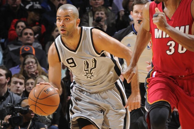 SAN ANTONIO, TX - FEBRUARY 6:  Tony Parker #9 of the San Antonio Spurs brings the ball up court against the Miami Heat on February 6, 2015 at the AT&T Center in San Antonio, Texas. NOTE TO USER: User expressly acknowledges and agrees that, by downloading and or using this Photograph, user is consenting to the terms and conditions of the Getty Images License Agreement. Mandatory Copyright Notice: Copyright 2015 NBAE (Photo by D. Clarke Evans/NBAE via Getty Images)