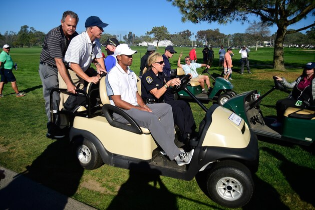 LA JOLLA, CA - FEBRUARY 05:  Tiger Woods leaves the course after withdrawing from the Farmers Insurance Open due to injury at Torrey Pines Golf Course on February 5, 2015 in La Jolla, California.  (Photo by Donald Miralle/Getty Images)