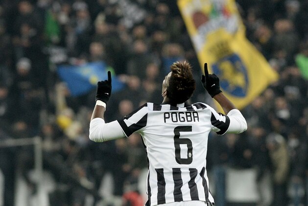 Juventus' Paul Pogba celebrates after scoring during a Serie A soccer match between Juventus and Hellas Verona at the Juventus stadium in Turin, Italy, Sunday, Jan. 18, 2015. (AP Photo/Massimo Pinca)