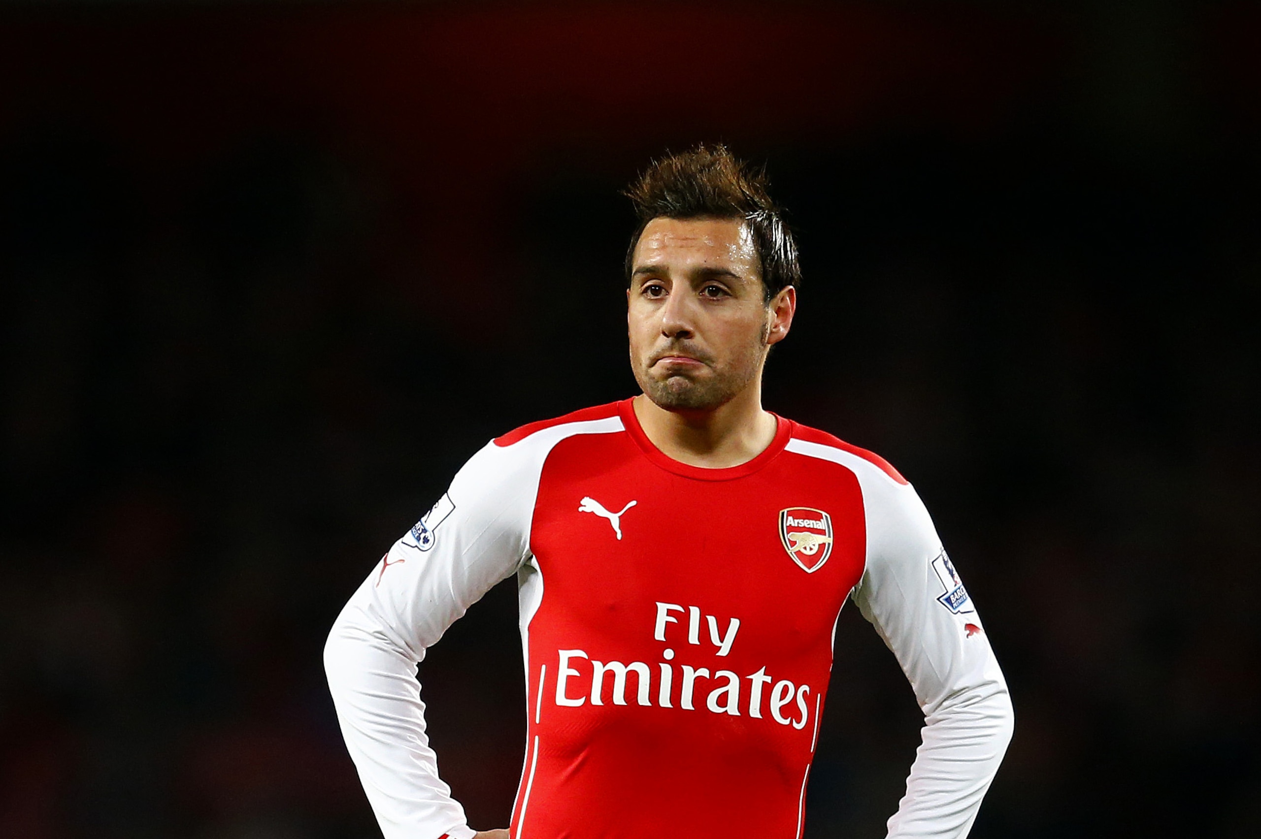 LONDON, ENGLAND - DECEMBER 03:  Santi Cazorla of Arsenal reacts during the Barclays Premier League match between Arsenal and Southampton at Emirates Stadium on December 3, 2014 in London, England.  (Photo by Julian Finney/Getty Images)