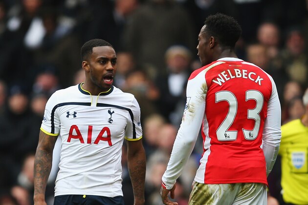 LONDON, ENGLAND - FEBRUARY 07: Danny Rose of Tottenham Hotspur exchanges words with Danny Welbeck of Arsenal during the Barclays Premier League match between Tottenham Hotspur and Arsenal at White Hart Lane on February 7, 2015 in London, England.  (Photo by Paul Gilham/Getty Images)