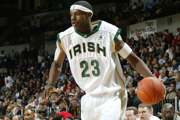 TRENTON, NJ - FEBRUARY 8:  LeBron James #23 of the St. Vincent-St. Mary Fighting Irish dribbles during the game against the Los Angeles Westchester Comets in the Primetime Shootout at Sovereign Bank Arena on February 8, 2003 in Trenton, New Jersey.  The Irish won 78-52.  NOTE TO USER: User expressly acknowledges and agrees that, by downloading and/or using this Photograph, User is consenting to the terms and conditions of the Getty Images License Agreement  Copyright 2003 NBAE  (Photo by Dave Saffran/NBAE via Getty Images)