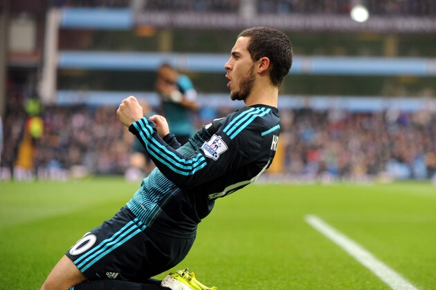 Chelsea's Eden Hazard celebrates after scoring against Villa during the English Premier League soccer match between Aston Villa and Chelsea at Villa Park, Birmingham, England, Saturday, Feb 7, 2015. (AP Photo/Rui Vieira)