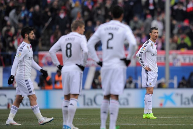 MADRID, SPAIN - FEBRUARY 07:  Cristiano Ronaldo of Real Madrid
reacts after Club Atletico de Madrid scored their 3rd goal during the La Liga match between Club Atletico de Madrid and Real Madrid at Vicente Calderon Stadium on February 7, 2015 in Madrid, Spain.  (Photo by Denis Doyle/Getty Images)