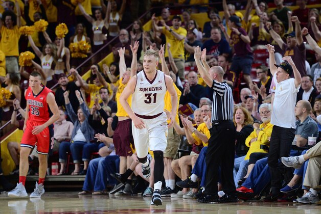Feb 7, 2015; Tempe, AZ, USA; Arizona State Sun Devils forward Jonathan Gilling (31) reacts after a three point basket against the Arizona Wildcats during the first half at Wells-Fargo Arena. Mandatory Credit: Joe Camporeale-USA TODAY Sports