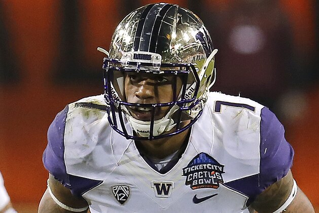 Washington linebacker Shaq Thompson (7) in the first half during the Cactus Bowl NCAA college football game against Oklahoma State, Friday, Jan. 2, 2015, in Tempe, Ariz. (AP Photo/Rick Scuteri)
