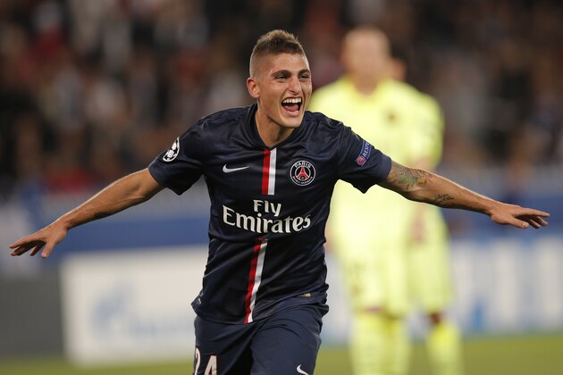 PSG's Marco Verratti celebrates after scoring his side's second goal during the Champions League soccer match between PSG and Barcelona, at the Parc des Princes stadium, in Paris, Tuesday, Sept. 30, 2014. (AP Photo/Christophe Ena)