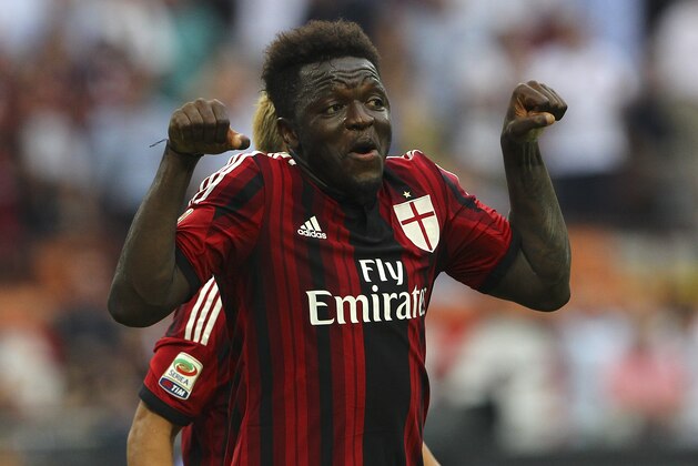 MILAN, ITALY - AUGUST 31:  Sulley Ali Muntari of AC Milan celebrates after scoring his goal during the Serie A match between AC Milan and SS Lazio at Stadio Giuseppe Meazza on August 31, 2014 in Milan, Italy.  (Photo by Marco Luzzani/Getty Images)