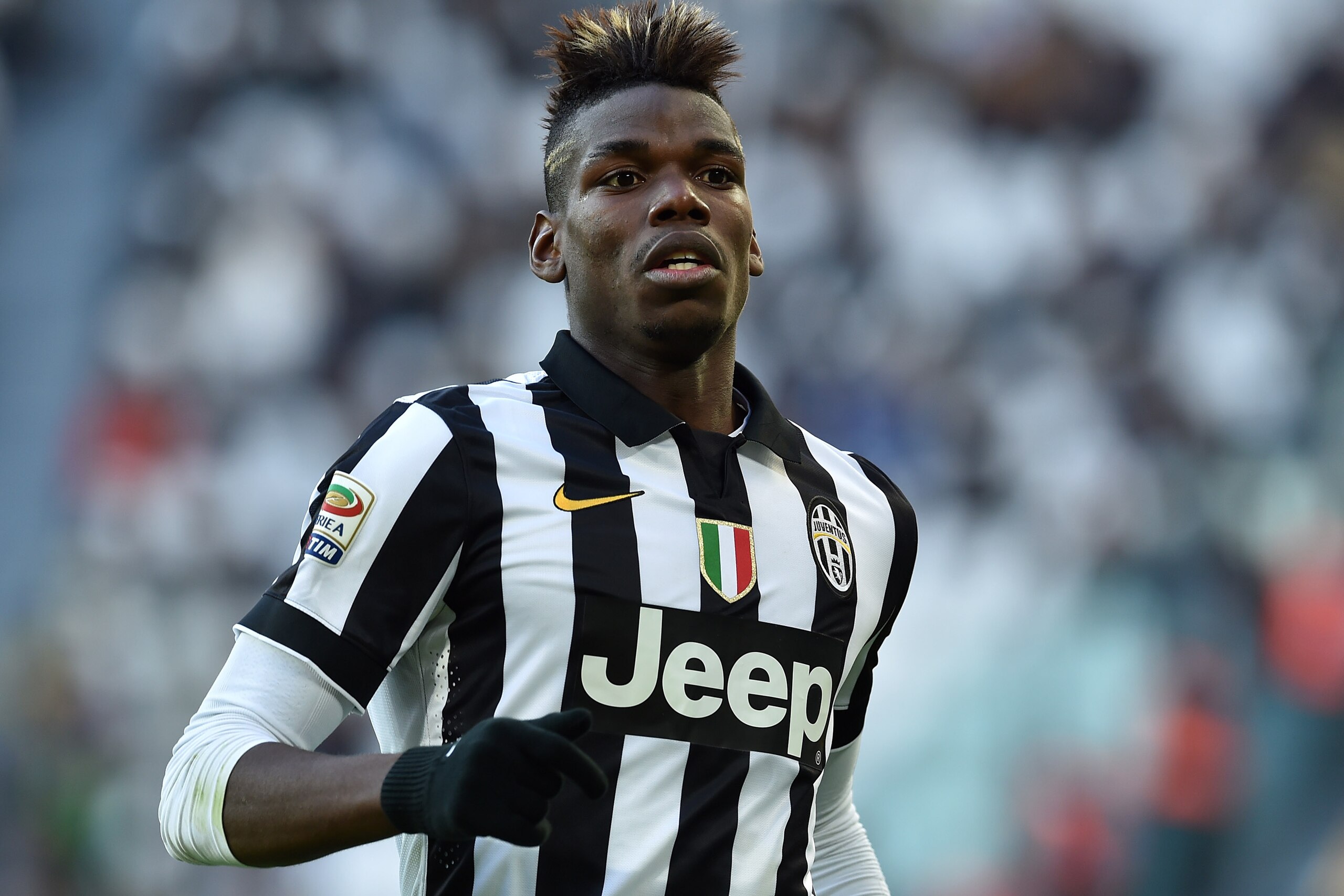 TURIN, ITALY - JANUARY 25:  Paul Pogba of Juventus FC looks on during the Serie A match between Juventus FC and AC Chievo Verona at Juventus Arena on January 25, 2015 in Turin, Italy.  (Photo by Valerio Pennicino/Getty Images)